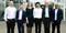 University Management standing in front of RLV campus