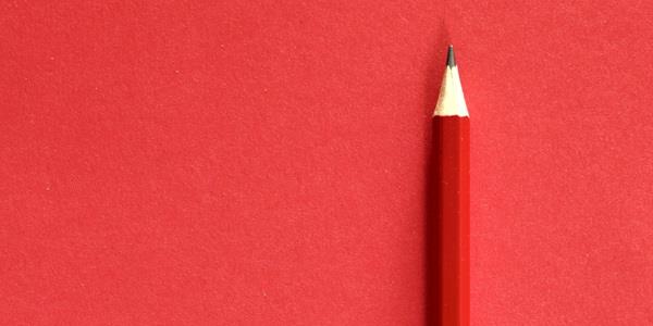 A pen on a red background