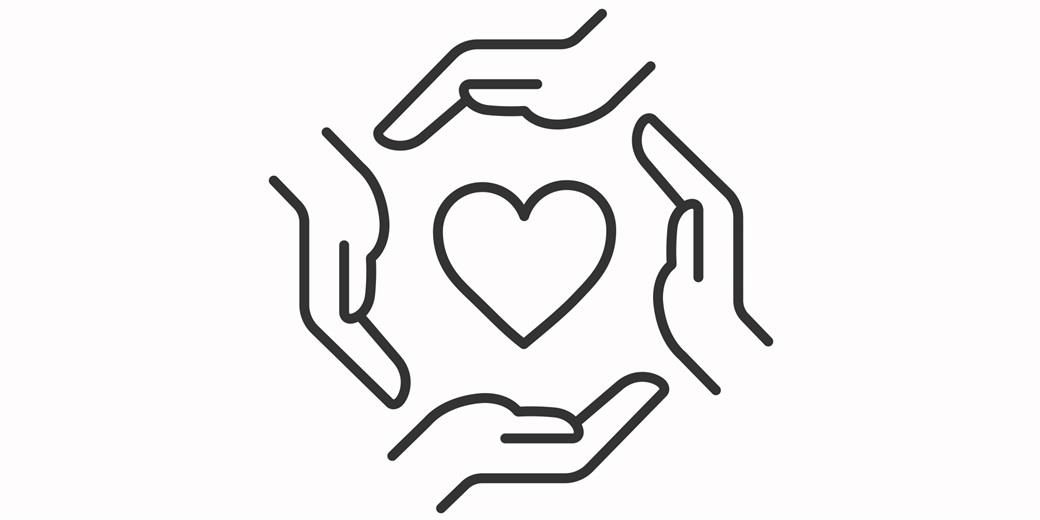Hands protecting a heart