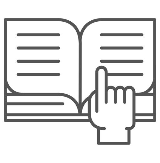 Finger pointing at text in a book
