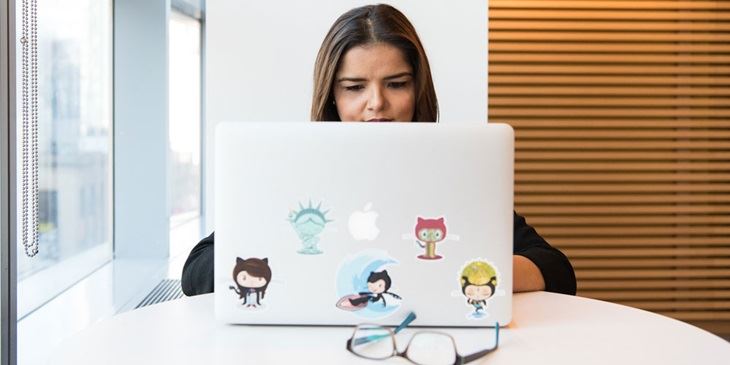 Woman using a Macbook