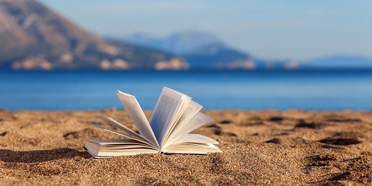 Open book on beach